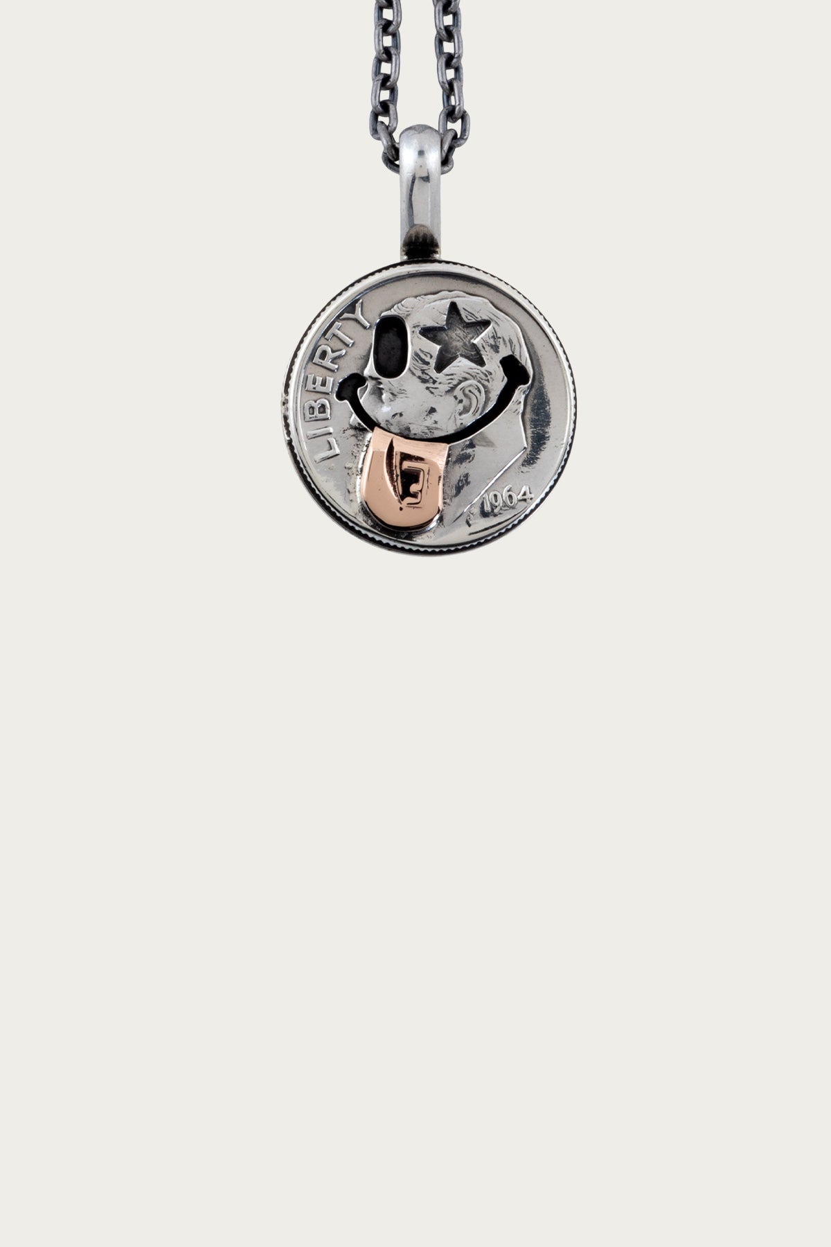 North Works - 10¢ Tongue Out Pendant - Canoe Club
