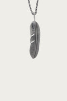 North Works - 25¢ Half Feather Pendant - Canoe Club